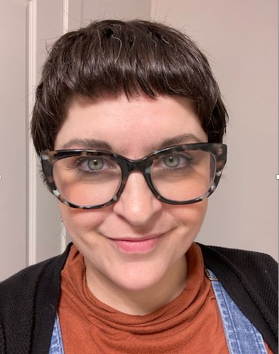 Orange top Rachel Aberle- Write Club